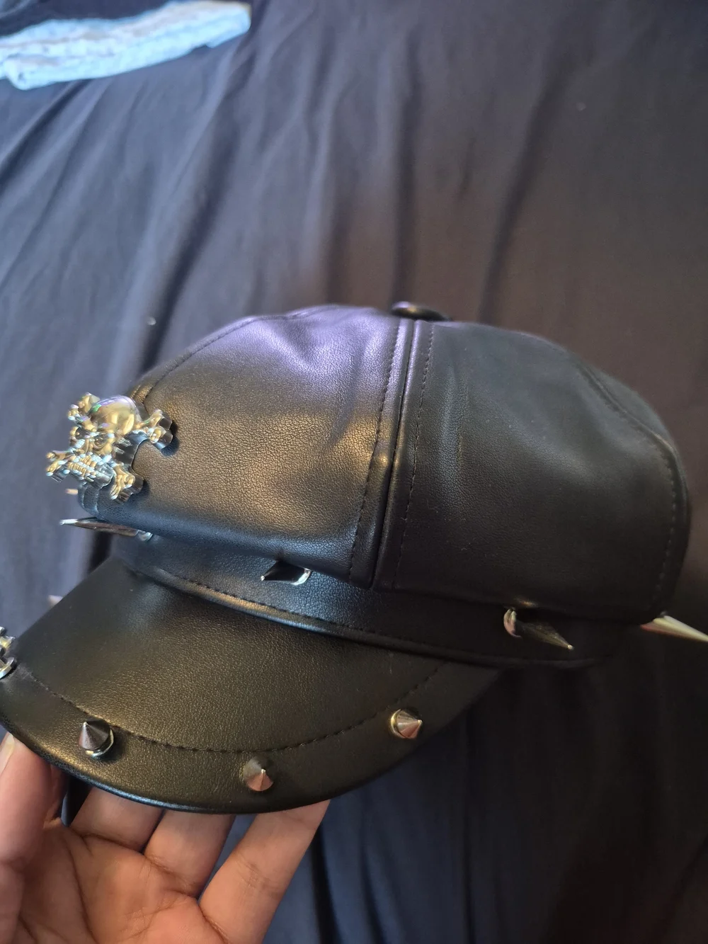 Black Faux Leather Spiked Cap with Skull Accent